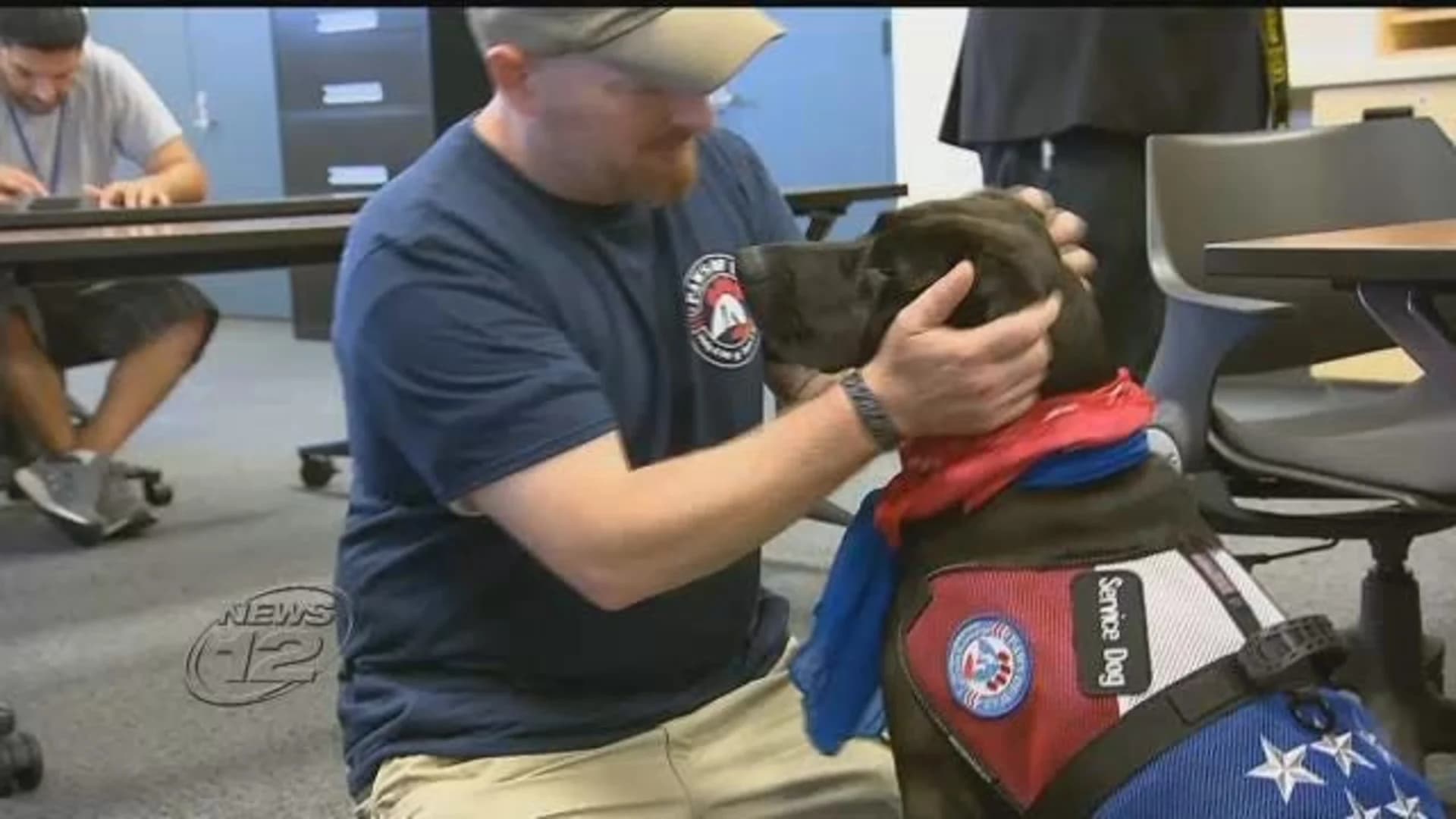 Marine veteran meets service dog trained at Suffolk County Jail