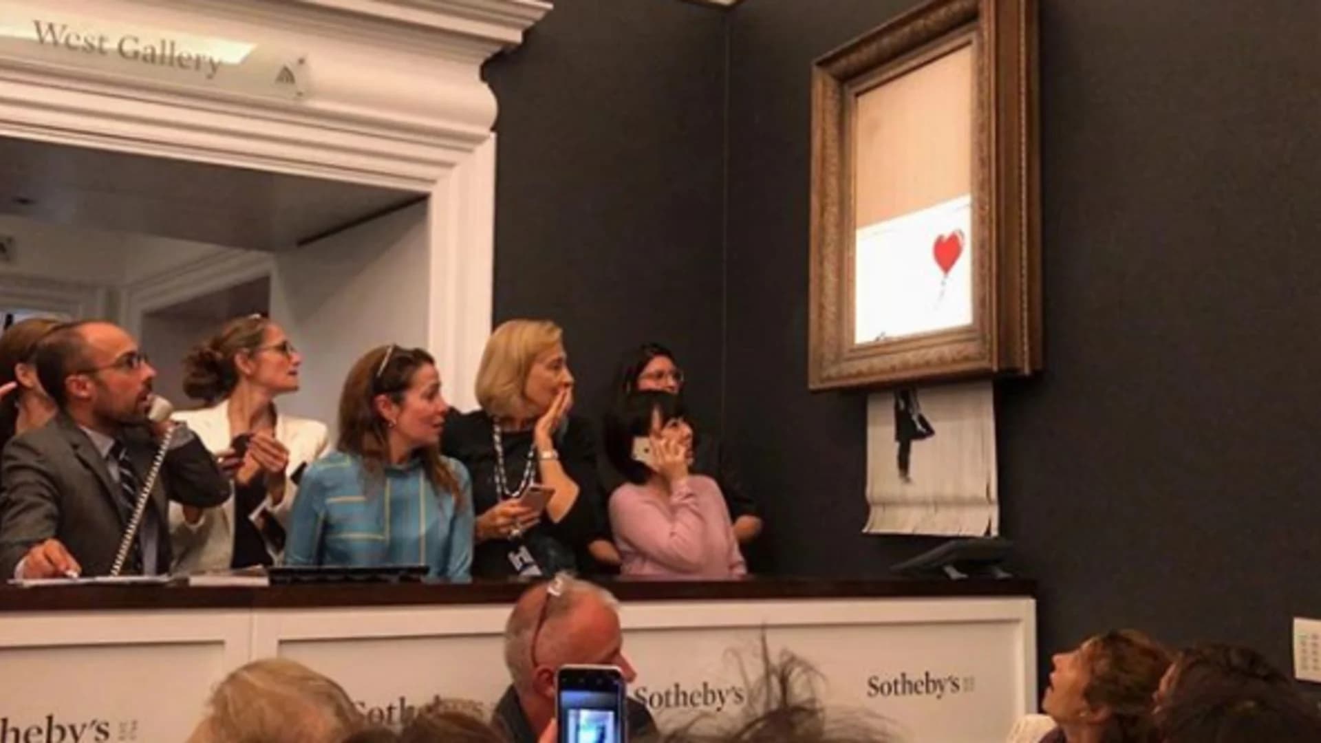 Banksy artwork self-destructs moment after $1.4 million sale