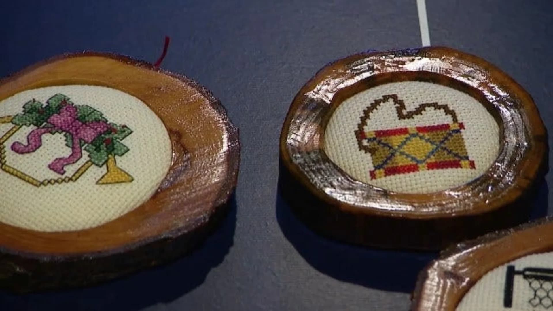East End: Ornament maker drops cigarettes for cross-stitching