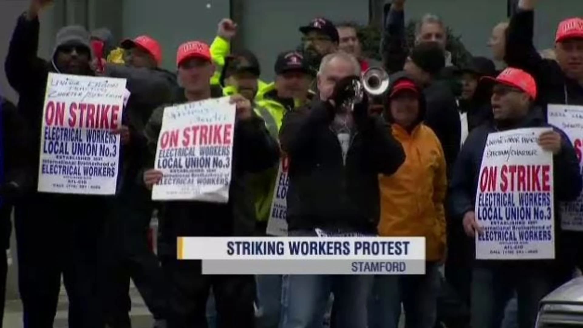 Striking Charter Communications workers protest in Stamford