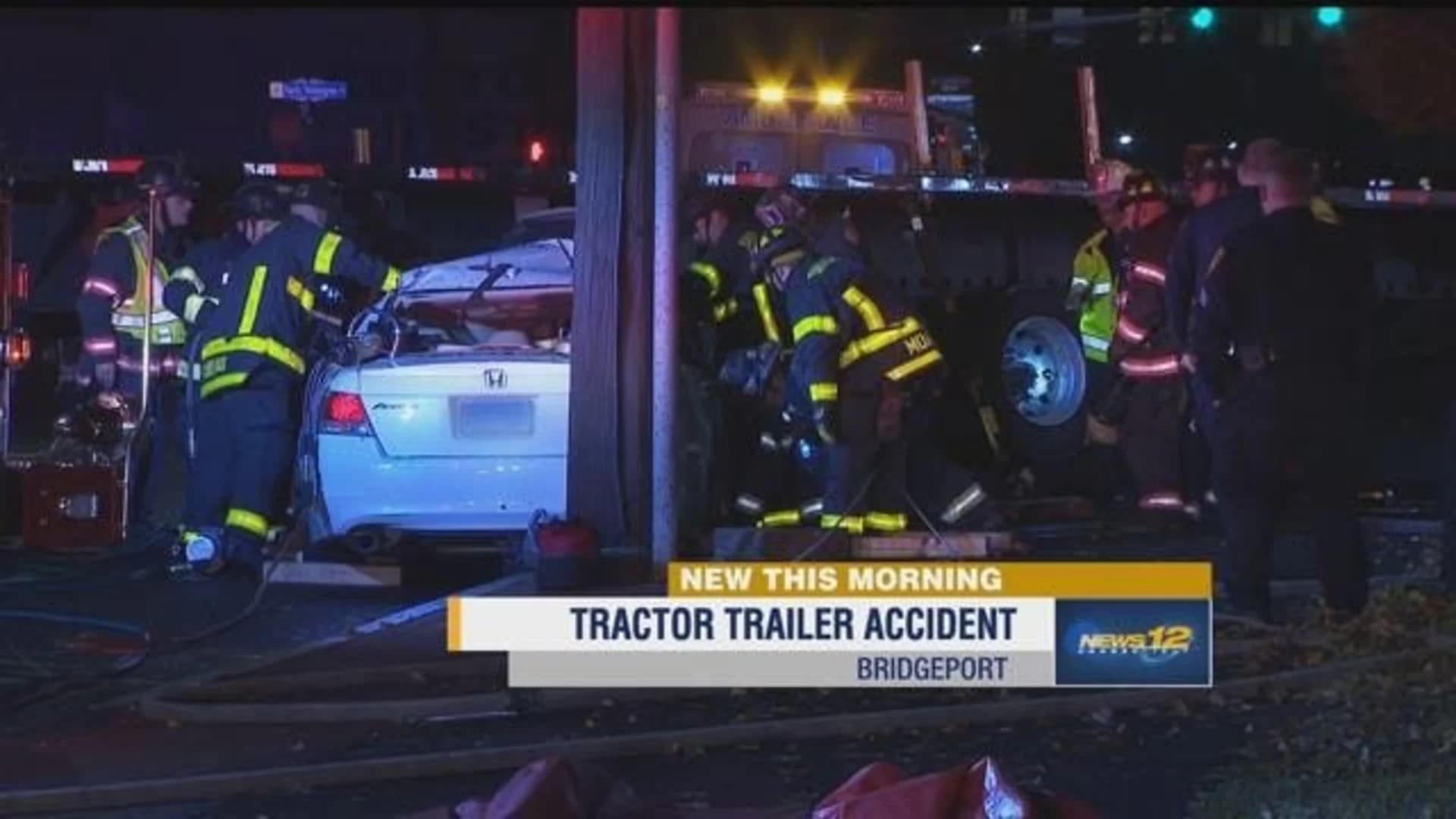 Police: Tractor-trailer backs up on car in Bridgeport