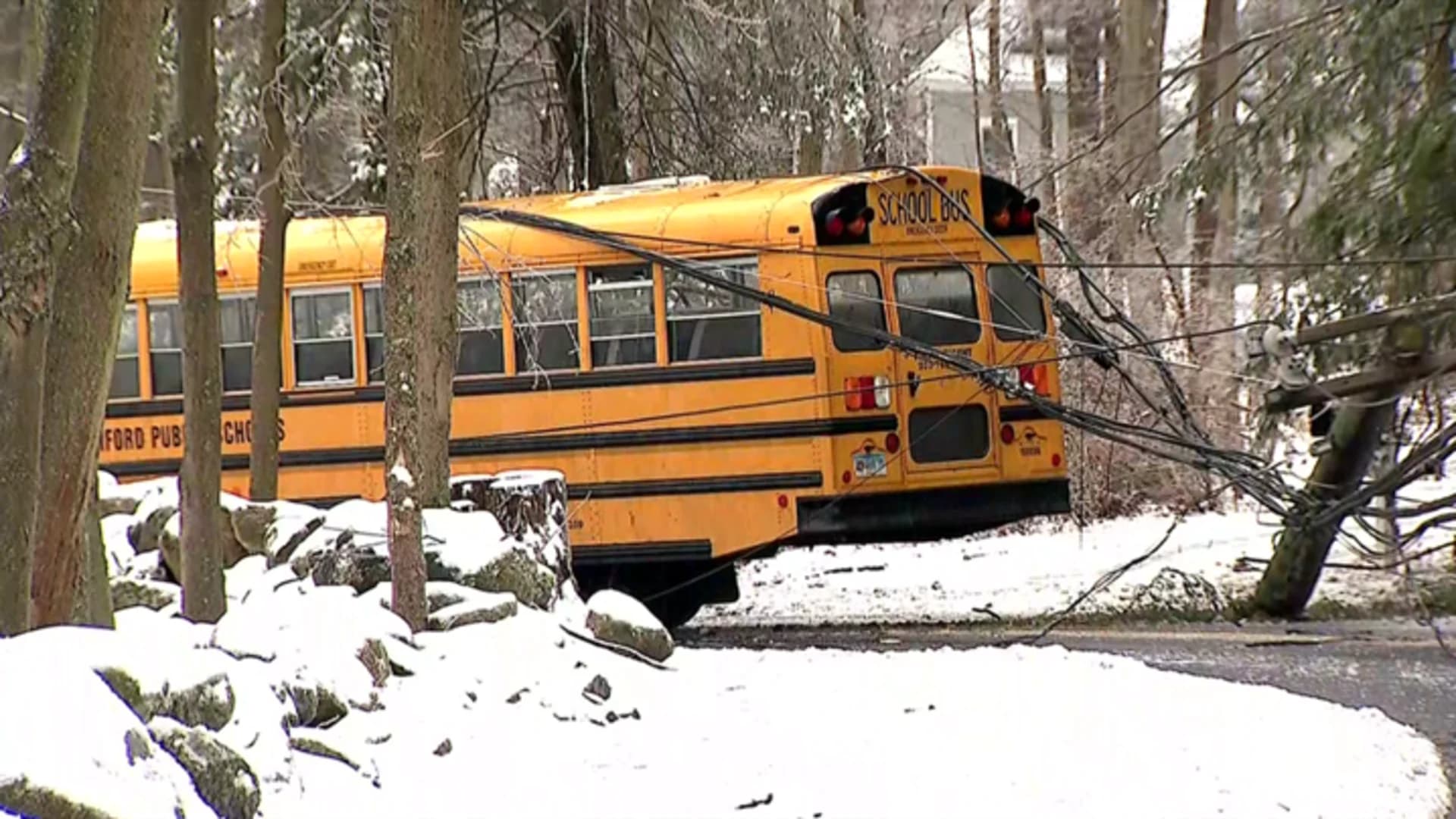 Live wires trap children after school bus strikes pole in Stamford