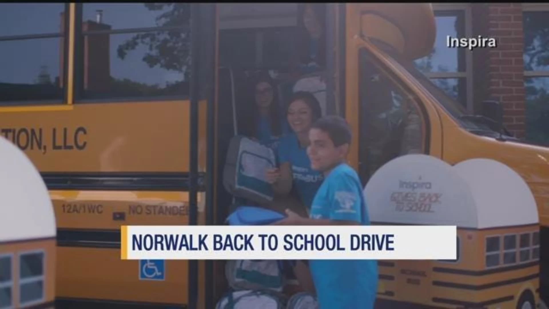Volunteers hand out school supplies in Norwalk