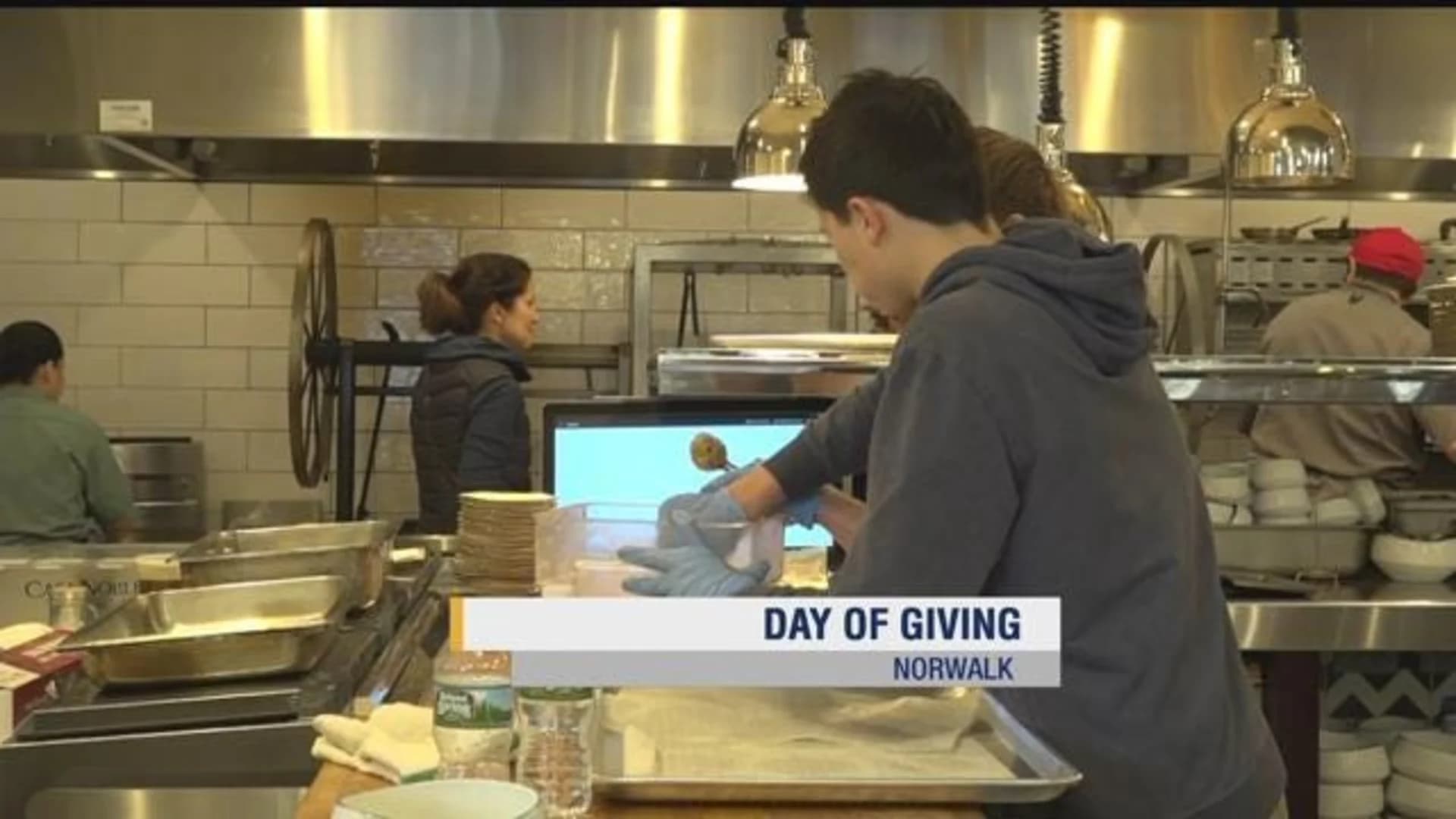 Norwalk residents prepare meals as part of Day of Giving