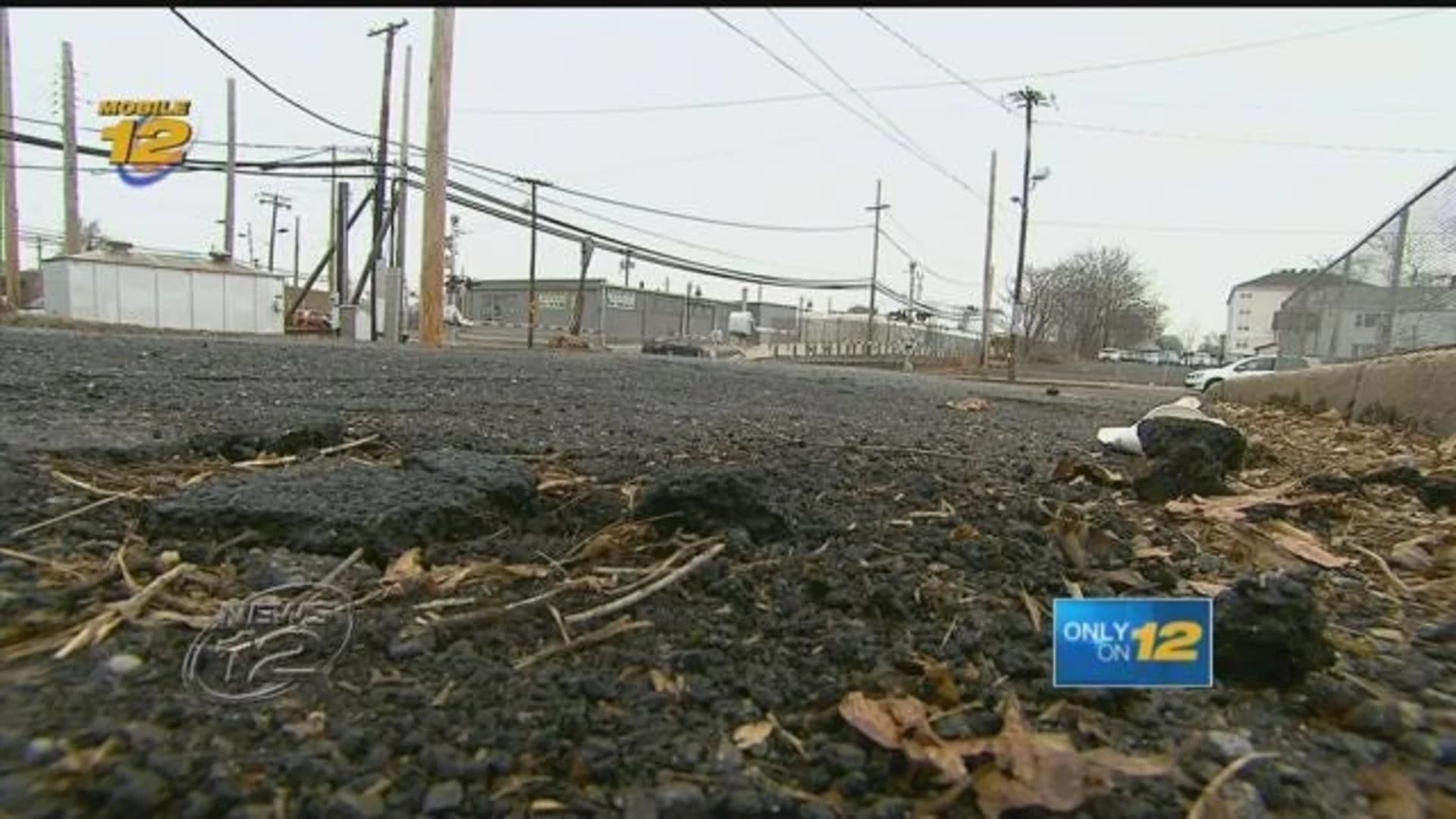 Mineola business owner calls on village to fix potholes