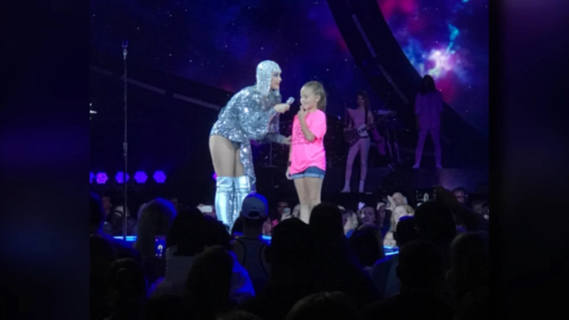 Young girl pulled up on stage by Katy Perry at Mohegan Sun concert