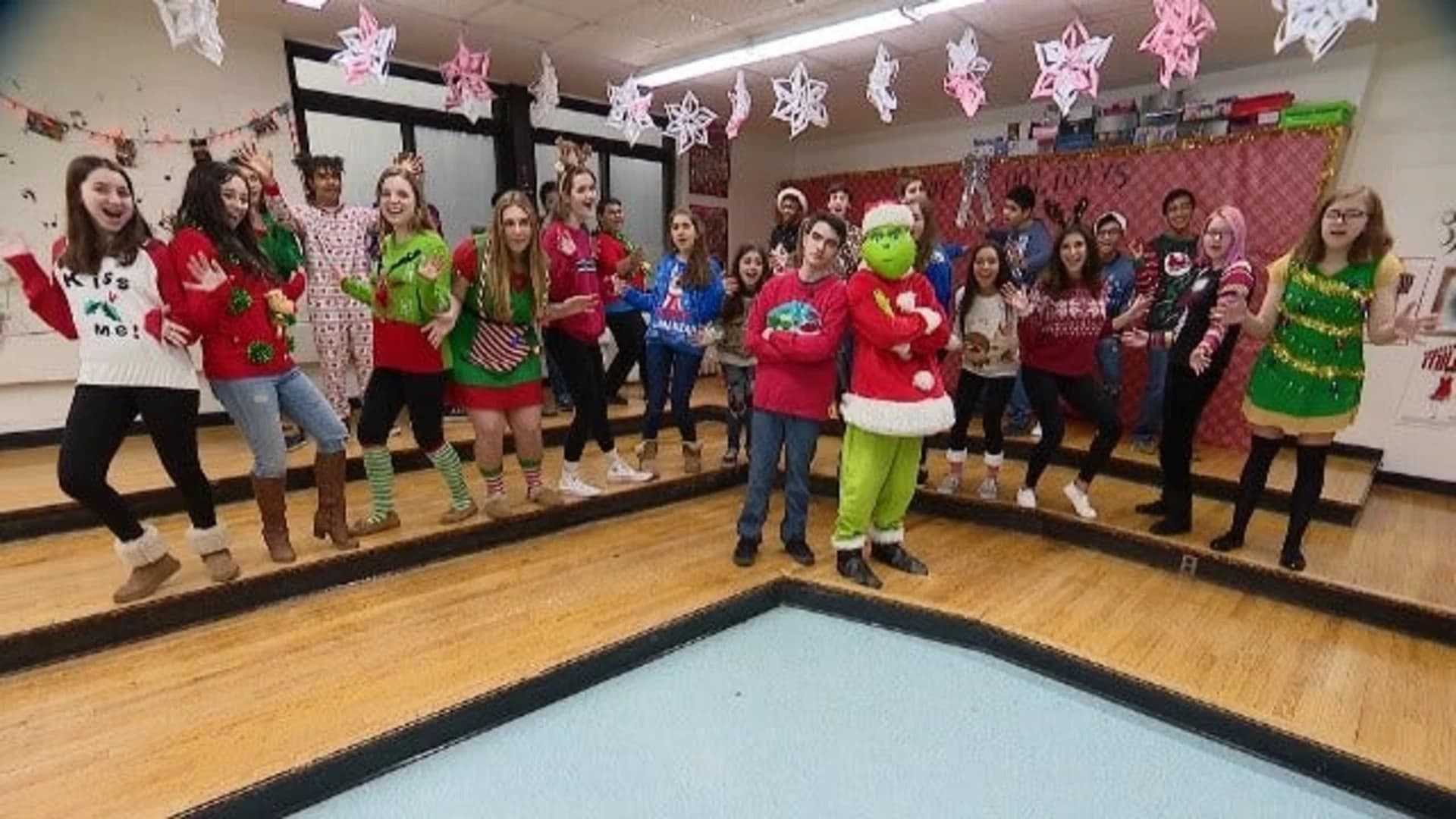 Huntington High School Chamber Choir performs holiday songs