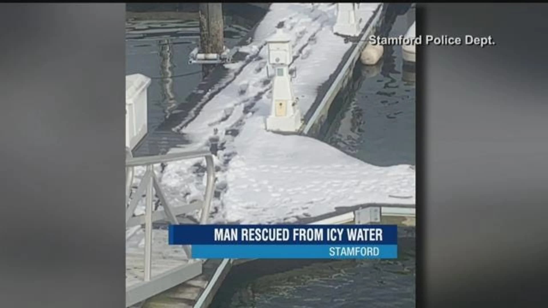 Man rescued from frigid waters at Stamford marina