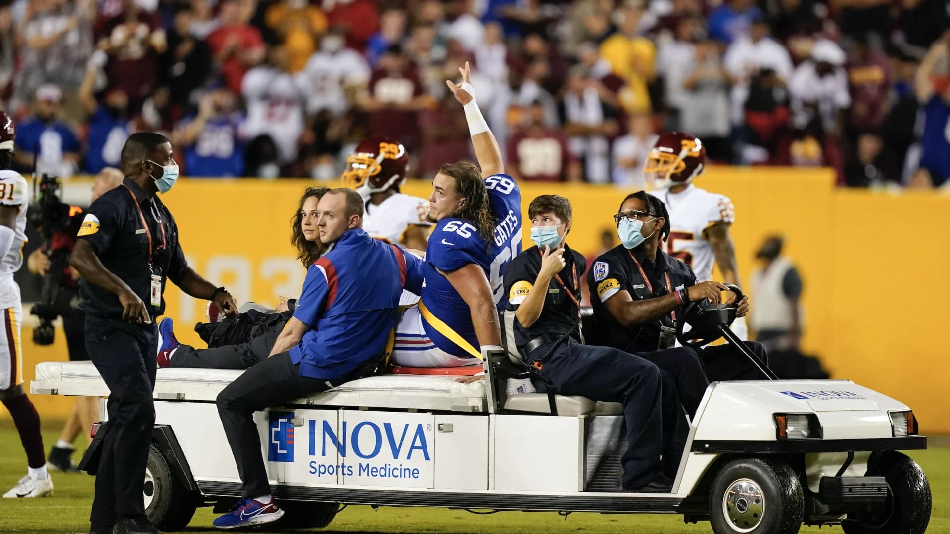 Giants' Gates carted off with broken leg against Washington